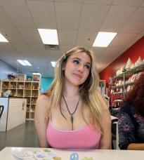 who is this cute busty girl?